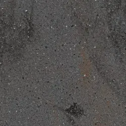 Dark speckled textured stone surface