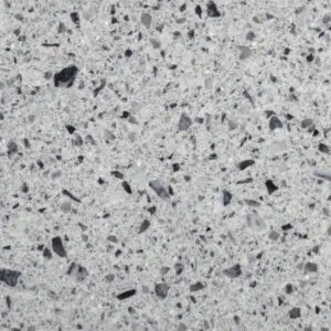 Speckled terrazzo pattern with mixed aggregates.
