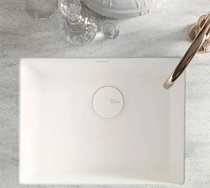 White rectangular bathroom sink with crystal decor