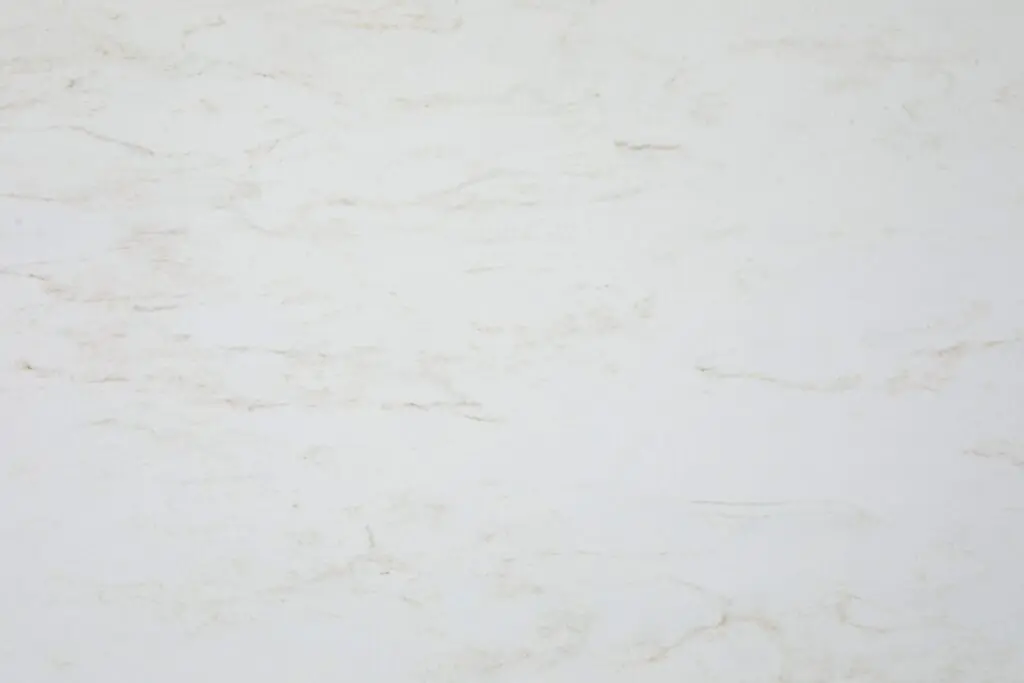White marble background with subtle beige veining