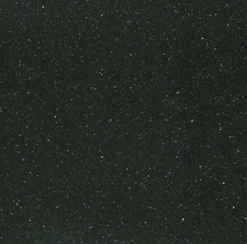 Dark stone surface with tiny flecks